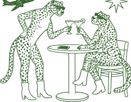 Two cheetahs toasting margaritas at a café table